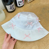 white with pink bow bucket hat